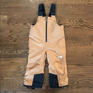 The North Face Camel and Black Snow Bib Overalls